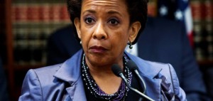 United States Attorney Loretta E. Lynch speaks during an announcement of the arrest of Abraxas J. ("A.J.") Discala, CEO of OmniView Capital, and six co-conspirators for fraudulent market manipulation at the U.S. Attorney's office in Brooklyn, New York July 17, 2014. Discala, 43, and the other defendants were accused of running a $300 million stock manipulation scheme that cheated elderly and other investors. REUTERS/Lucas Jackson (UNITED STATES - Tags: BUSINESS CRIME LAW HEADSHOT)